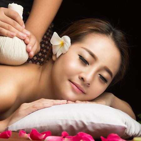 Outrigger Surin Beach Resort - Sha Extra Plus Bagian luar foto Thai herbal compress massage