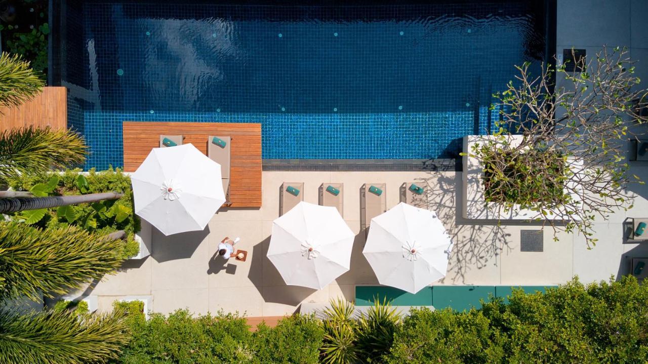 Outrigger Surin Beach Resort - Sha Extra Plus Bagian luar foto The pool at the Beverly Hills Hotel