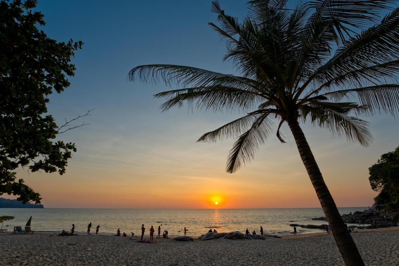 Outrigger Surin Beach Resort - Sha Extra Plus Bagian luar foto Sunset at Tanjung Puteri Beach