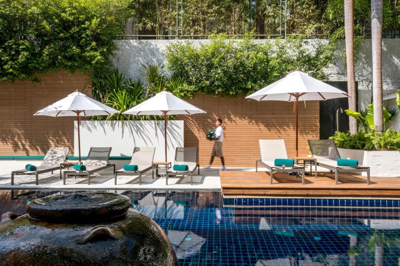 Outrigger Surin Beach Resort - Sha Extra Plus Bagian luar foto The swimming pool at the hotel