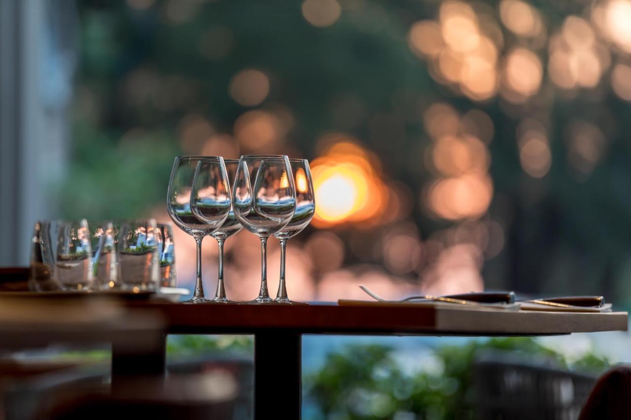 Outrigger Surin Beach Resort - Sha Extra Plus Bagian luar foto Wine glasses