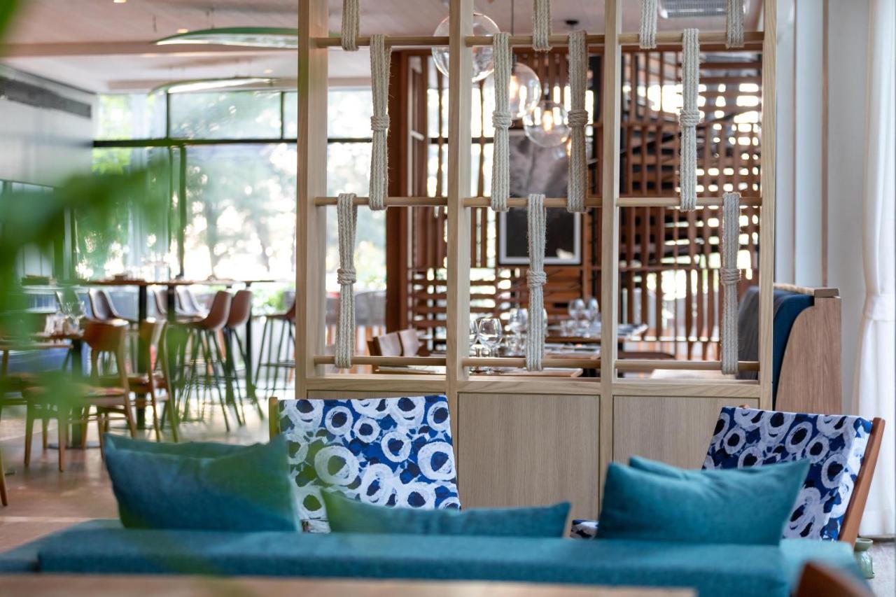 Outrigger Surin Beach Resort - Sha Extra Plus Bagian luar foto The restaurant