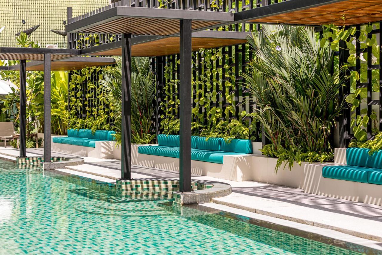 Outrigger Surin Beach Resort - Sha Extra Plus Bagian luar foto The pool at the hotel