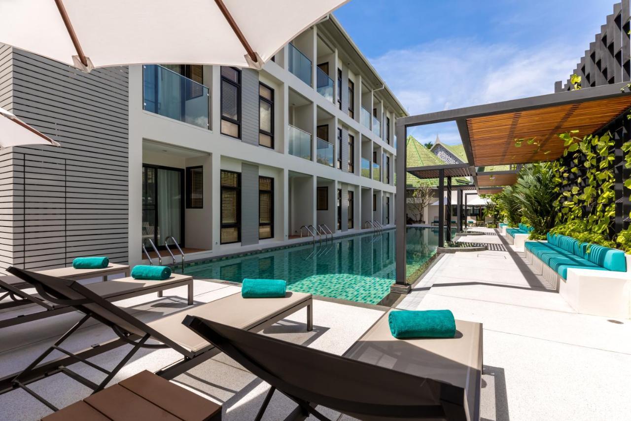 Outrigger Surin Beach Resort - Sha Extra Plus Bagian luar foto The swimming pool at the hotel
